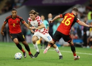 米兰,-比利时队在比赛中展现出技高一筹，助球队晋级